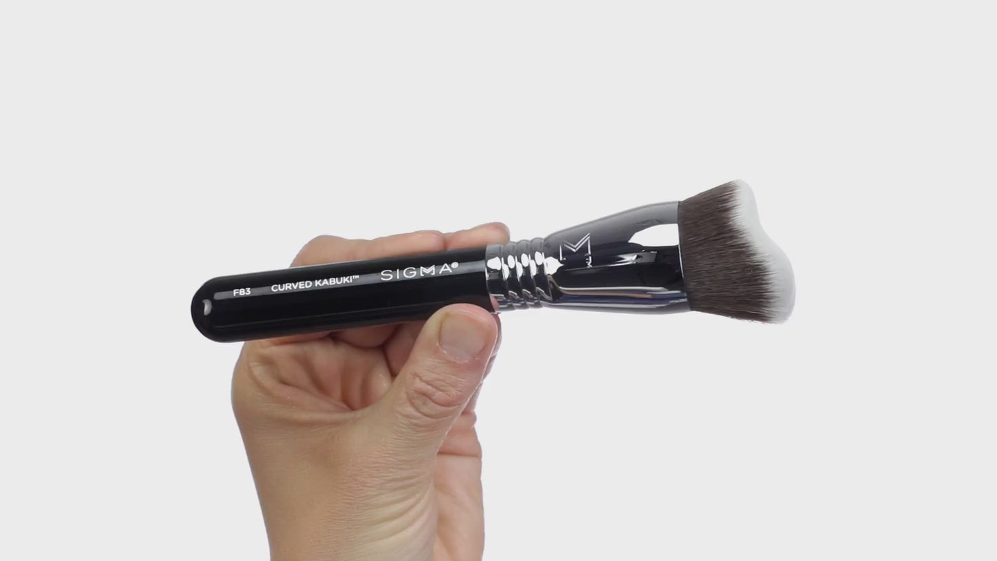 Load and play video in Gallery viewer, Sigma Beauty F83 Curved Kabuki Brush
